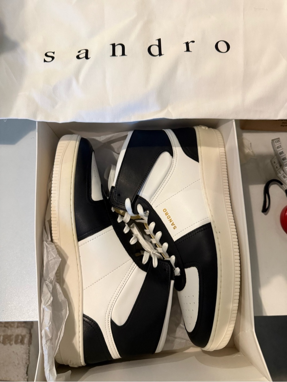 Sandro Black and White Low-Top Leather Sneakers